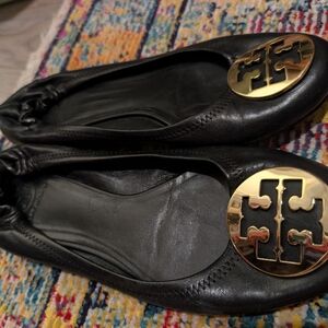 Tory Burch Black Flats with Gold Emblem